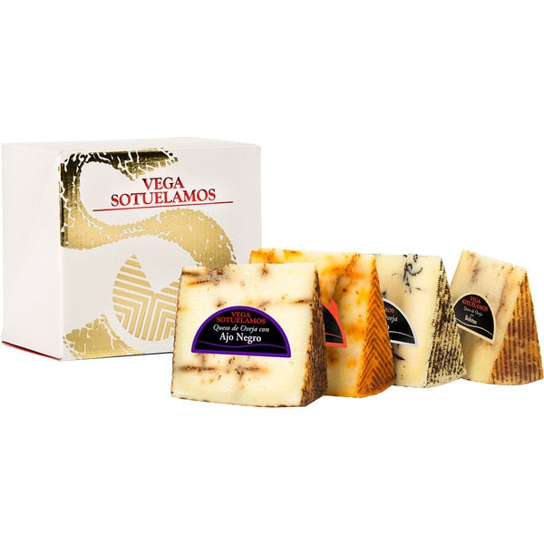 Case with 4 wedges of cured sheep's milk cheese made with pasteurized milk, black garlic, porcini mushrooms, truffle and mojo picón sauce x 200gr each). VEGA SOTUELAMOS